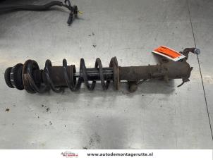 O208659 Gebruikte veerpoot links-voor Nissan Micra