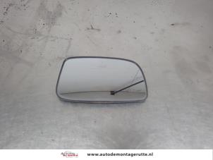 O209002 Gebruikte spiegelglas rechts Daihatsu Sirion