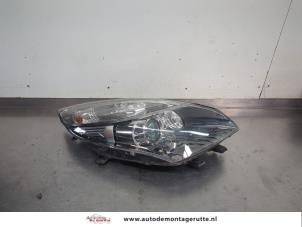 O208990 Gebruikte koplamp rechts Renault Grand Scenic