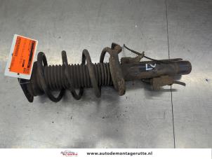O209134 Gebruikte mac phersonpoot links-voor Ford Focus