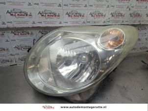 O209197 Gebruikte linker koplamp Suzuki Alto