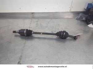 O209217 Gebruikte homokineetas links-voor Nissan Micra