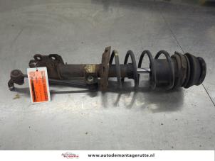 O209270 Gebruikte voorpoot links Opel Corsa