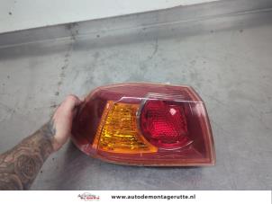 O209278 Gebruikte achterlicht links Mitsubishi Lancer