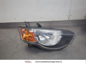 O209303 Gebruikte rechter koplamp Mitsubishi Colt