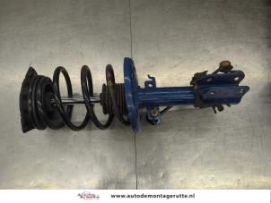 O209348 Gebruikte schokdemperpoot rechts-voor Renault Grand Scenic
