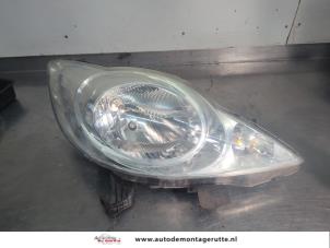O209369 Gebruikte rechter koplamp Peugeot 107