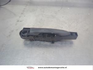 O209480 Gebruikte portiergreep 2deurs links Renault Kangoo