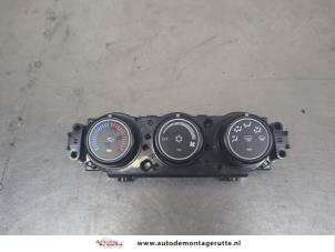 O209574 Gebruikte chaufage bedieningspaneel Mitsubishi Lancer