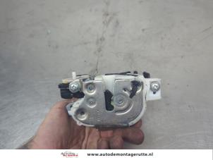 O209593 Gebruikte deurslot mechaniek 4deurs rechts-achter Mitsubishi Lancer
