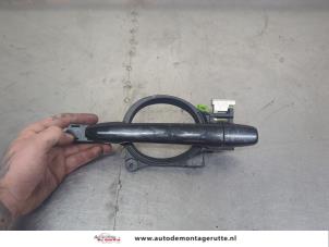 O209587 Gebruikte portiergreep 4deurs links-achter Mitsubishi Lancer