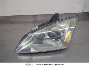 O209601 Gebruikte koplamp links Ford Focus