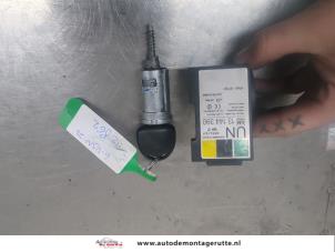 O209607 Gebruikte sleutel+contactslot Opel Combo