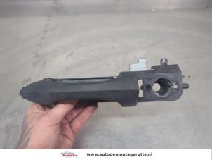 O209643 Gebruikte portiergreep 4deurs links-voor Ford Focus