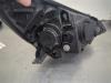 Gebruikte Koplamp links Kia Rio O209705