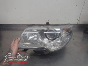 O209873 Gebruikte linker koplamp Skoda Superb