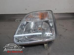 O209992 Gebruikte koplamp links Opel Agila
