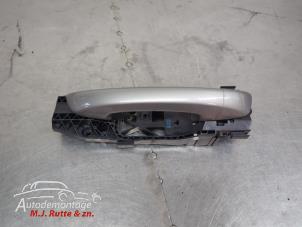 O210015 Gebruikte portiergreep 4deurs links-achter Skoda Superb