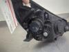Gebruikte Koplamp links Kia Rio O210053