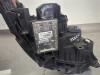 Gebruikte Koplamp links Renault Megane O210056