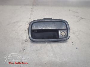 O210084 Gebruikte achterklep handgreep Daihatsu Cuore