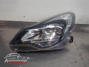 O210122 Gebruikte koplamp links Opel Corsa