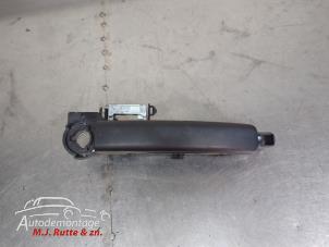 O210168 Gebruikte portiergreep 2deurs links Renault Trafic