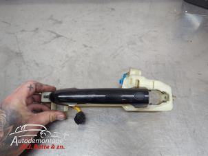 O210188 Gebruikte deurgreep 2deurs links Kia Rio