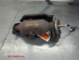 O210459 Gebruikte uitlaatspruitstuk + katalysator Toyota Aygo