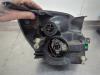 Gebruikte Koplamp links Ford Fiesta O210499