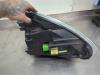 Gebruikte Koplamp links Ford Fiesta O210499