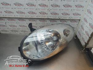 O210514 Gebruikte rechter koplamp Nissan Micra