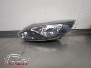 O210721 Gebruikte koplamp links Ford Focus