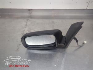 O210752 Gebruikte spiegel buiten links Daihatsu Sirion