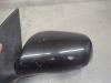 Gebruikte Spiegel Buiten links Daihatsu Sirion O210752