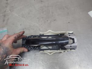 O210791 Gebruikte portiergreep 4deurs links-voor Skoda Octavia