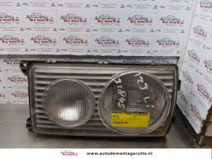 O71882 Gebruikte koplamp links Mercedes 200 - 500
