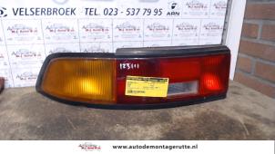 O93188 Gebruikte achterlicht links Mazda 323F