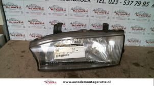 O72484 Gebruikte koplamp links Subaru Legacy