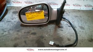 O85599 Gebruikte buitenspiegel links Daihatsu Sirion