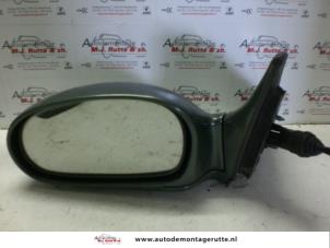 O85039 Gebruikte buitenspiegel links Kia Rio
