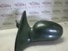Gebruikte Buitenspiegel links Kia Rio O85039