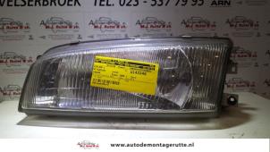 O72867 Gebruikte koplamp links Mitsubishi Lancer