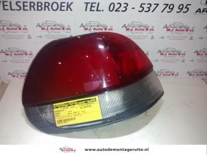 O93426 Gebruikte achterlicht links Subaru Legacy