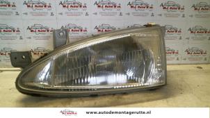 O72360 Gebruikte koplamp links Hyundai Excel