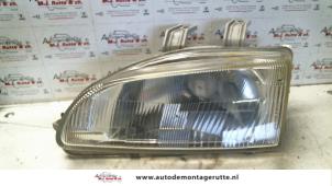 O72908 Gebruikte koplamp links Honda Civic
