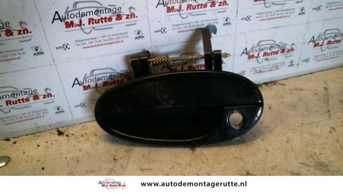 Gebruikte Portiergreep 4Deurs links-voor Daewoo Tacuma O80289