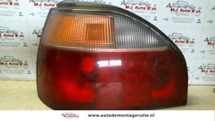 O93337 Gebruikte achterlicht links Nissan Sunny