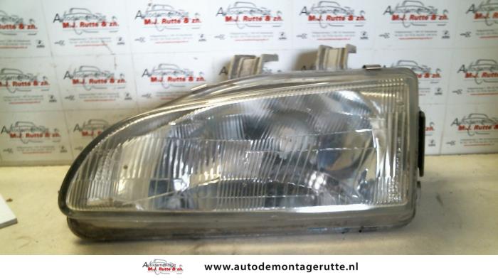 Gebruikte Koplamp links Honda Civic O132218