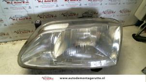 O72745 Gebruikte linker koplamp Renault Megane Scenic